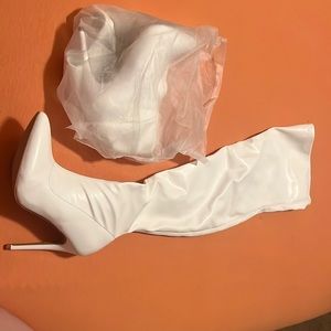 White heeled thigh high boots